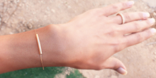 Load image into Gallery viewer, ISABELLA Dainty 14K Goldplate Tube Layering Bracelet
